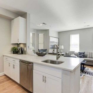 Upstairs at Bethesda Row Renovated Kitchen Living Room
